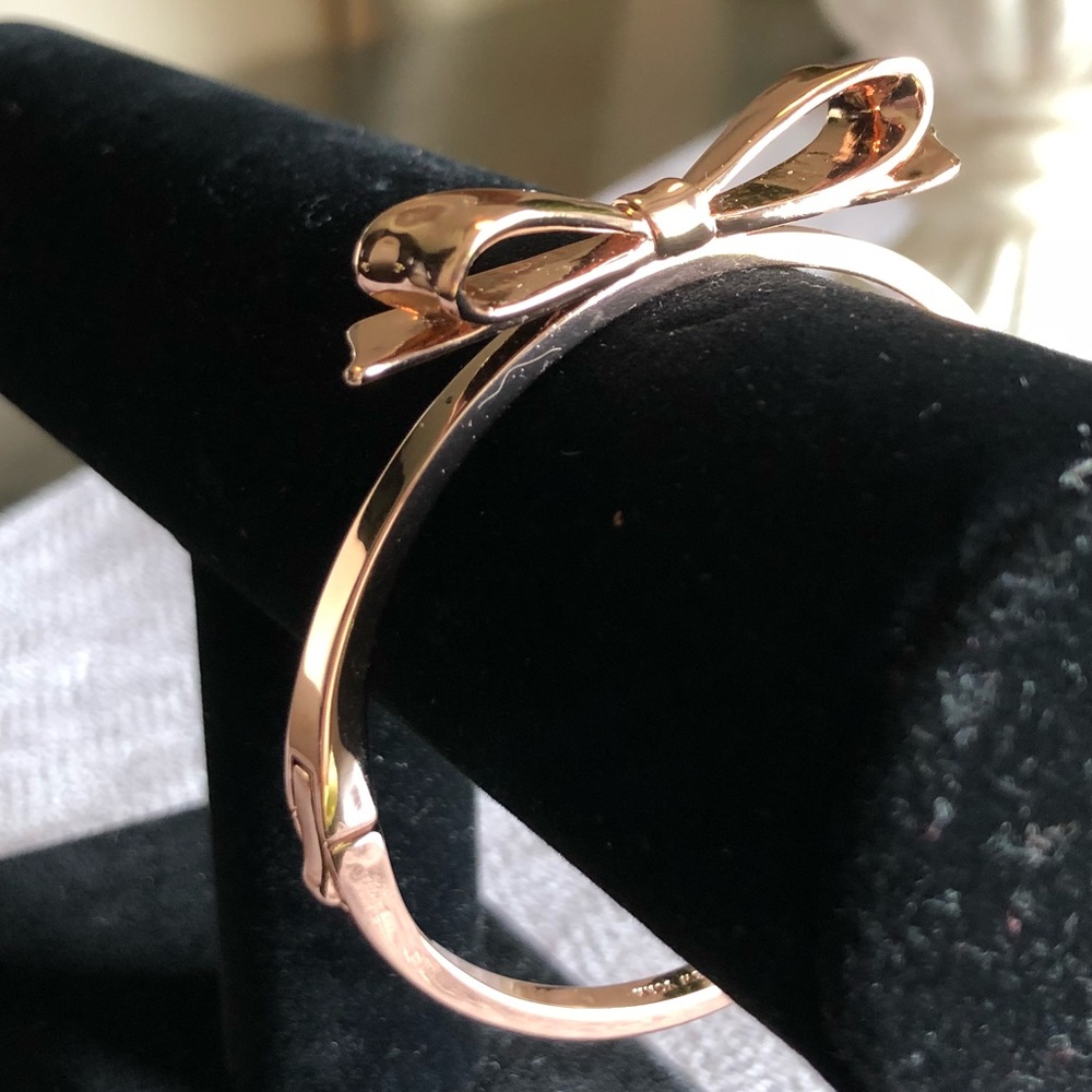 Kate Spade Rose tone bangle bracelet